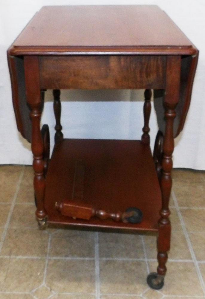 Walnut Tea Cart, As Found: Walnut Tea Cart, As Found. 28 1/2" H 25 3/4" W 18" D "ALL DESCRIPTIONS AND ANY CONDITION STATEMENT GIVEN BY LANGSTON AUCTION GALLERY ARE STRICTLY OPINIONS AND LANGSTON'S SHALL HAVE NO RESPONSIBILITY