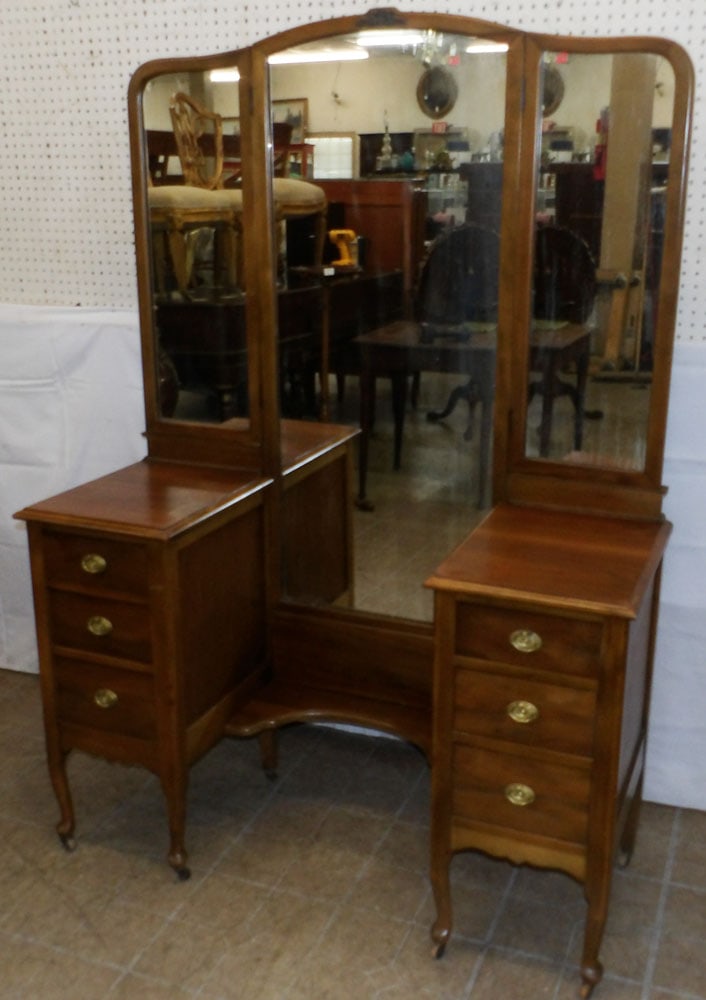 Antique Walnut Dresser with Folding Mirror: Antique Walnut Dresser with Folding Mirror. 67 1/2" H 48" W 18" D "ALL DESCRIPTIONS AND ANY CONDITION STATEMENT GIVEN BY LANGSTON AUCTION GALLERY ARE STRICTLY OPINIONS AND LANGSTON'S SHALL HAVE NO
