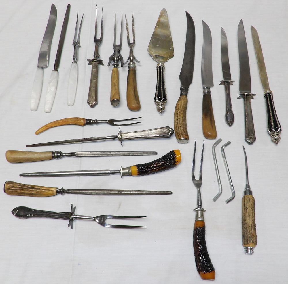 Lot of Carving Sets: Lot of Carving Sets . Up to 14 3/4" L "ALL DESCRIPTIONS AND ANY CONDITION STATEMENT GIVEN BY LANGSTON AUCTION GALLERY ARE STRICTLY OPINIONS AND LANGSTON'S SHALL HAVE NO RESPONSIBILITY FOR ERRORS OR