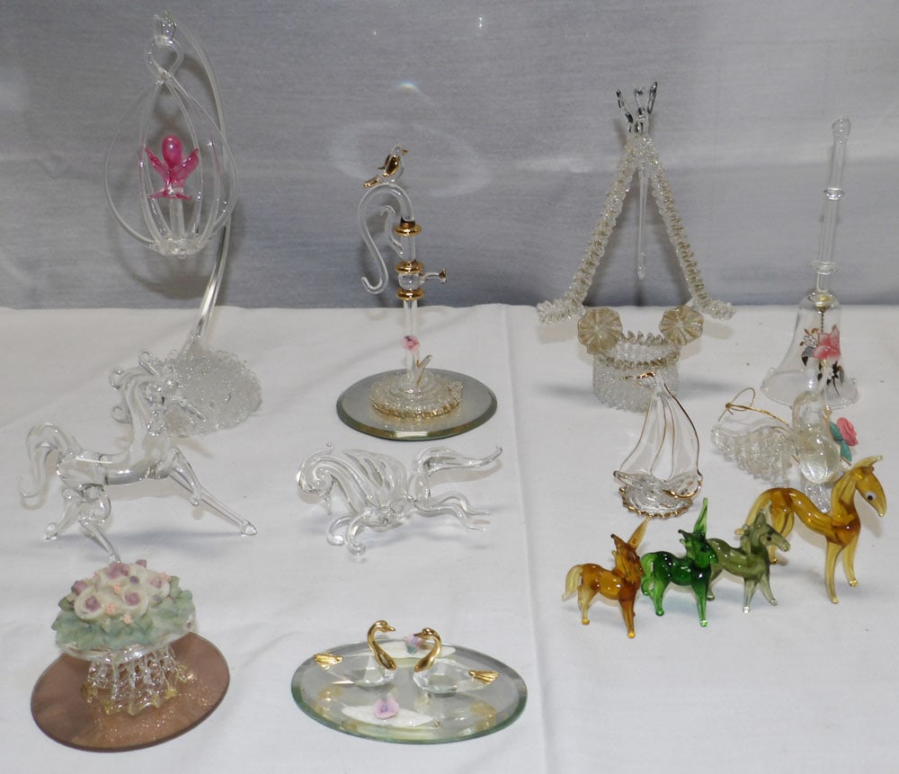 Lot of Miniature Glass Figurines: Lot of Miniature Glass Figurines . Up to 7 1/4" x 2 1/2" "ALL DESCRIPTIONS AND ANY CONDITION STATEMENT GIVEN BY LANGSTON AUCTION GALLERY ARE STRICTLY OPINIONS AND LANGSTON'S SHALL HAVE NO RESPONSIBILI