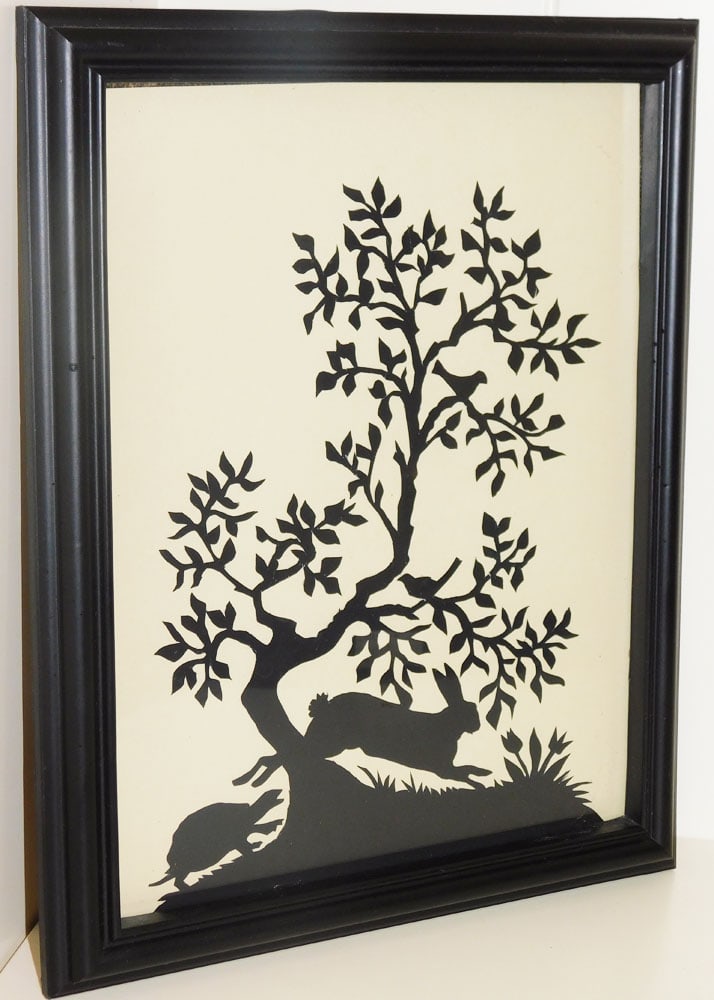 Framed Paper Cut Silhouette of "The Tortoise & Hare": Framed Paper Cut Silhouette of "The Tortoise & Hare". 10" x 12" "ALL DESCRIPTIONS AND ANY CONDITION STATEMENT GIVEN BY LANGSTON AUCTION GALLERY ARE STRICTLY OPINIONS AND LANGSTON'S SHALL HAVE NO