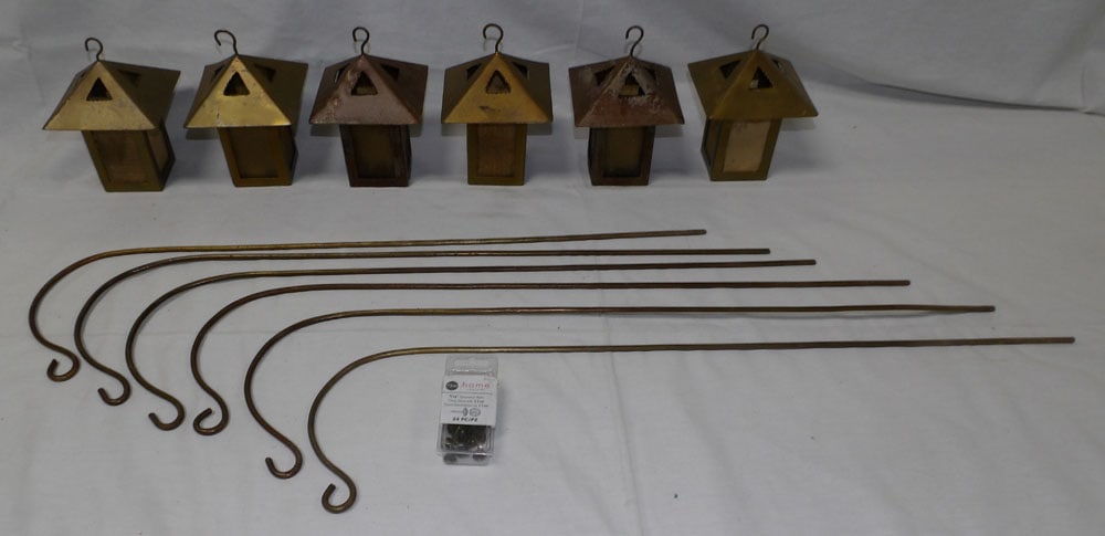 Lot of Painted Metal Yard Candle Lanterns: Lot of Painted Metal Yard Candle Lanterns . Up to 26" H 6 1/2" W ALL DESCRIPTIONS AND ANY CONDITION STATEMENT GIVEN BY LANGSTON AUCTION GALLERY ARE STRICTLY OPINIONS AND LANGSTON'S SHALL HAVE NO RESPO