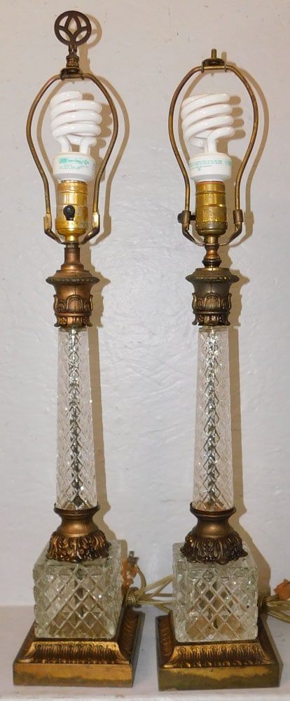 Pair of Gilded Metal & Crystal Lamps: Pair of Gilded Metal & Crystal Lamps . 28 1/2" H 5" Dia. ALL DESCRIPTIONS AND ANY CONDITION STATEMENT GIVEN BY LANGSTON AUCTION GALLERY ARE STRICTLY OPINIONS AND LANGSTON'S SHALL HAVE NO