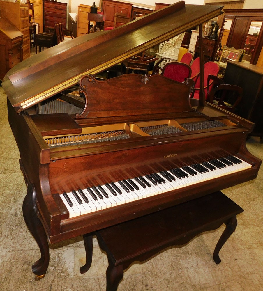 Antique Walnut Schubert Baby Grand Piano with Bench: Antique Walnut Schubert Baby Grand Piano with Bench . 38 1/2" H 51" W 55" D ALL DESCRIPTIONS AND ANY CONDITION STATEMENT GIVEN BY LANGSTON AUCTION GALLERY ARE STRICTLY OPINIONS AND LANGSTON'S SHALL