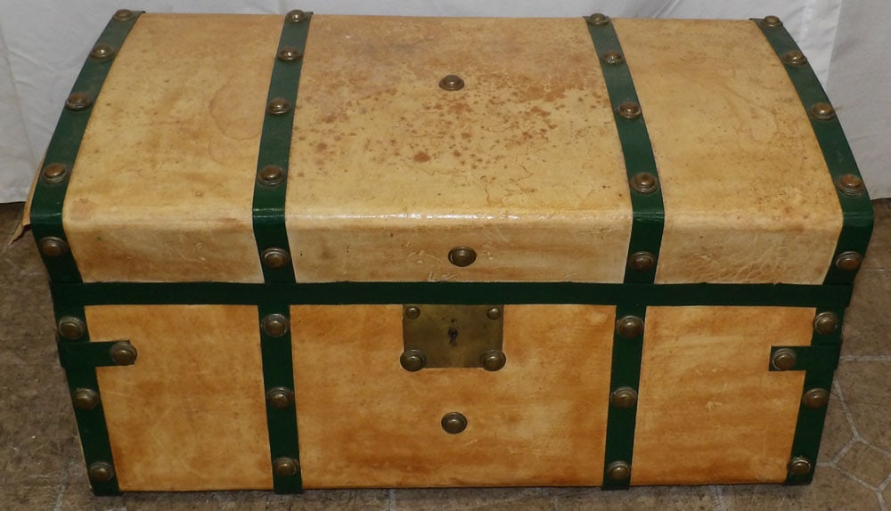 Antique Leather & Metal Bound Trunk: Antique Leather & Metal Bound Trunk. 13 1/2" H 26" W 14 1/2" D ALL DESCRIPTIONS AND ANY CONDITION STATEMENT GIVEN BY LANGSTON AUCTION GALLERY ARE STRICTLY OPINIONS AND LANGSTON'S SHALL HAVE NO