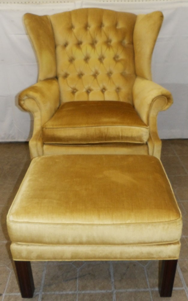 Upholstered Wing Back Chair & Ottoman by Temple: Upholstered Wing Back Chair & Ottoman by Temple . 41" H 33 1/2" W 29" D ALL DESCRIPTIONS AND ANY CONDITION STATEMENT GIVEN BY LANGSTON AUCTION GALLERY ARE STRICTLY OPINIONS AND LANGSTON'S SHALL HAVE