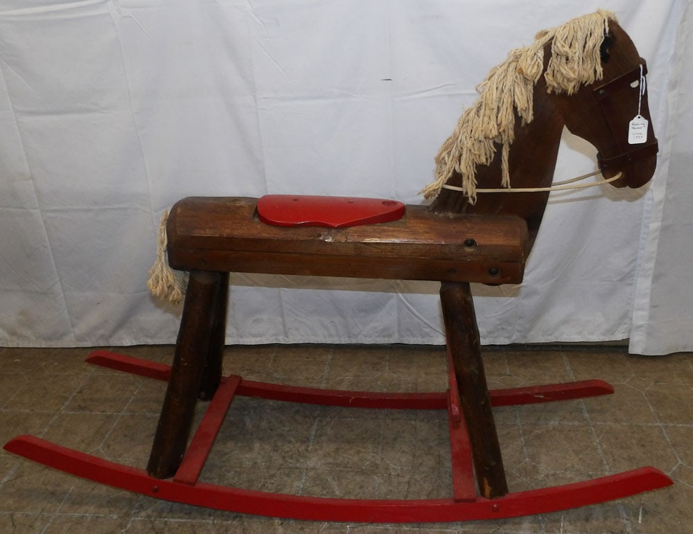 Pine Rocking Horse: Pine Rocking Horse. 34" H 47 3/4" W 13 3/4" D ALL DESCRIPTIONS AND ANY CONDITION STATEMENT GIVEN BY LANGSTON AUCTION GALLERY ARE STRICTLY OPINIONS AND LANGSTON'S SHALL HAVE NO RESPONSIBILITY FOR