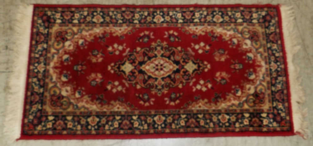 4' 3" x 2' Machine Made Rug: 4' 3" x 2' Machine Made Rug . ALL DESCRIPTIONS AND ANY CONDITION STATEMENT GIVEN BY LANGSTON AUCTION GALLERY ARE STRICTLY OPINIONS AND LANGSTON'S SHALL HAVE NO RESPONSIBILITY FOR ERRORS OR OMISSIONS.