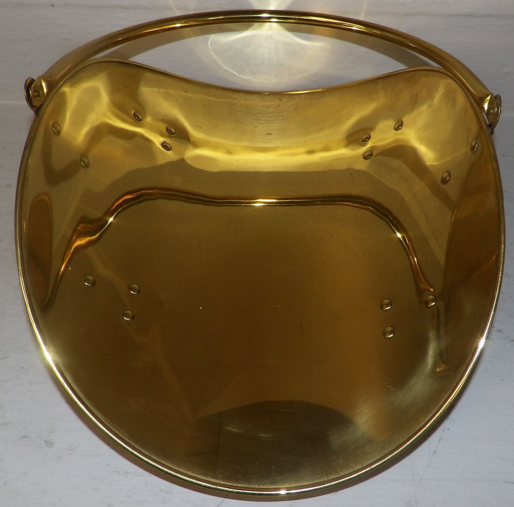 Brass Log Holder: Brass Log Holder. 8" H 14 1/4" W 19 1/4" D ALL DESCRIPTIONS AND ANY CONDITION STATEMENT GIVEN BY LANGSTON AUCTION GALLERY ARE STRICTLY OPINIONS AND LANGSTON'S SHALL HAVE NO RESPONSIBILITY FOR ERRORS
