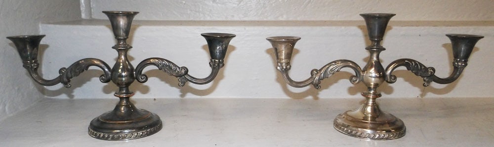 Pair of Silverplated Three Light Candelabras: Pair of Silverplated Three Light Candelabras. 7 1/4" H 13 1/4" W ALL DESCRIPTIONS AND ANY CONDITION STATEMENT GIVEN BY LANGSTON AUCTION GALLERY ARE STRICTLY OPINIONS AND LANGSTON'S SHALL HAVE NO