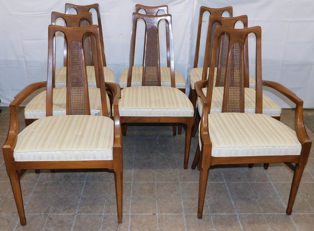 Set of Eight Mid Century Modern Walnut & Cane Back Dining Chairs: Set of Eight Mid Century Modern Walnut & Cane Back Dining Chairs . 38" H 22 1/4" W 21 1/2" D ALL DESCRIPTIONS AND ANY CONDITION STATEMENT GIVEN BY LANGSTON AUCTION GALLERY ARE STRICTLY OPINIONS AND