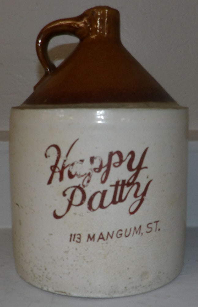 Stoneware Whisky Jug: Stoneware Whisky Jug. 13 1/4" H 9" Dia. ALL DESCRIPTIONS AND ANY CONDITION STATEMENT GIVEN BY LANGSTON AUCTION GALLERY ARE STRICTLY OPINIONS AND LANGSTON'S SHALL HAVE NO RESPONSIBILITY FOR ERRORS OR