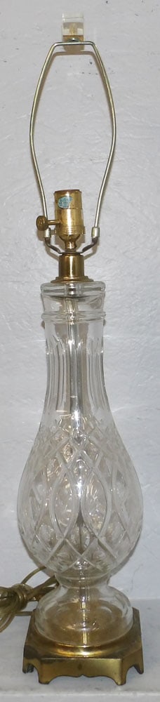 Crystal & Gilded Metal Lamp: Crystal & Gilded Metal Lamp. 31" H 6" Dia. ALL DESCRIPTIONS AND ANY CONDITION STATEMENT GIVEN BY LANGSTON AUCTION GALLERY ARE STRICTLY OPINIONS AND LANGSTON'S SHALL HAVE NO RESPONSIBILITY FOR ERRORS