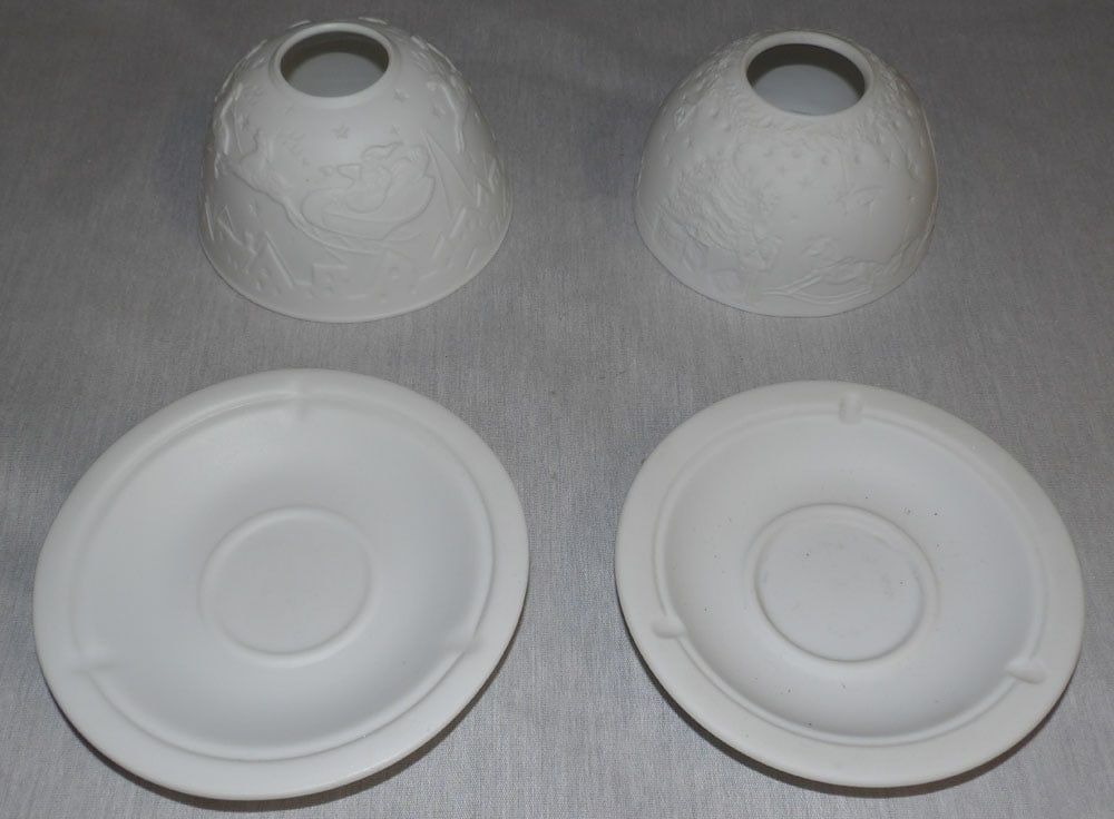 Two Seagull Studios Candle Lamps: Two Seagull Studios Candle Lamps. 2 3/4" H 4 3/4" Dia. ALL DESCRIPTIONS AND ANY CONDITION STATEMENT GIVEN BY LANGSTON AUCTION GALLERY ARE STRICTLY OPINIONS AND LANGSTON'S SHALL HAVE NO RESPONSIBILITY