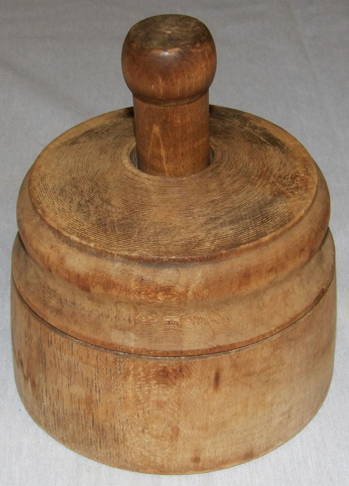 Antique Butter Mold: Antique Butter Mold. 5 1/2" H 4 3/4" Dia. ALL DESCRIPTIONS AND ANY CONDITION STATEMENT GIVEN BY LANGSTON AUCTION GALLERY ARE STRICTLY OPINIONS AND LANGSTON'S SHALL HAVE NO RESPONSIBILITY FOR ERRORS OR