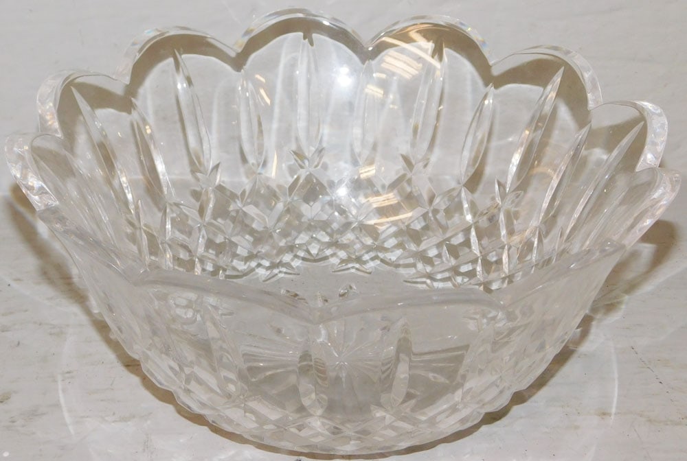 Scalloped Edge Waterford Crystal Bowl: Scalloped Edge Waterford Crystal Bowl. 4" H 9" Dia. "ALL DESCRIPTIONS AND ANY CONDITION STATEMENT GIVEN BY LANGSTON AUCTION GALLERY ARE STRICTLY OPINIONS AND LANGSTON'S SHALL HAVE NO RESPONSIBILITY