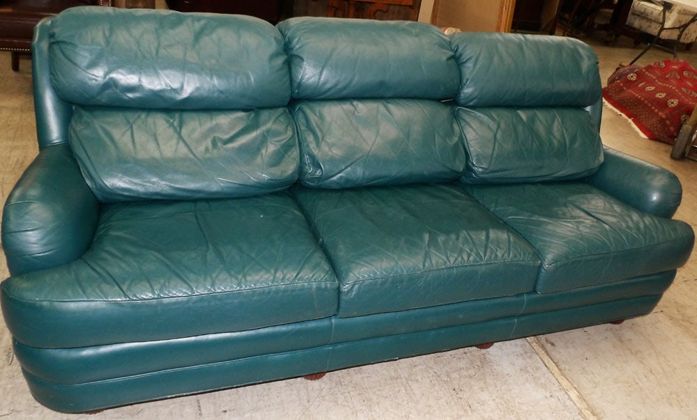 Leather Upholstered Sofa by Classic Leather: Leather Upholstered Sofa by Classic Leather . 36" H 86" W 40" D "ALL DESCRIPTIONS AND ANY CONDITION STATEMENT GIVEN BY LANGSTON AUCTION GALLERY ARE STRICTLY OPINIONS AND LANGSTON'S SHALL HAVE NO
