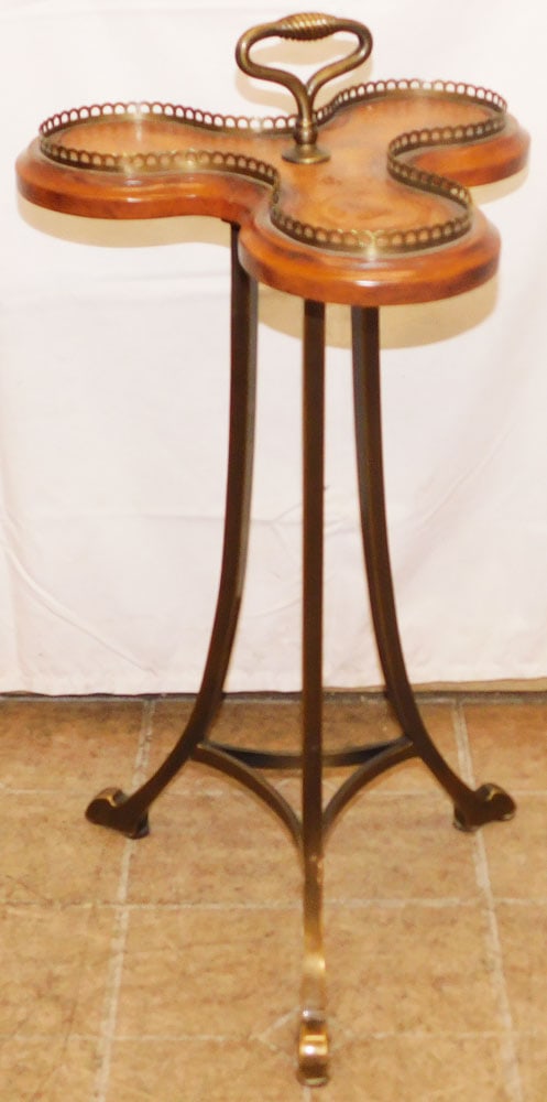 Mahogany Brass & Leather Revolving Stand: Mahogany Brass & Leather Revolving Stand . 28 1/2" H 15" Dia. "ALL DESCRIPTIONS AND ANY CONDITION STATEMENT GIVEN BY LANGSTON AUCTION GALLERY ARE STRICTLY OPINIONS AND LANGSTON'S SHALL HAVE NO RESPONS