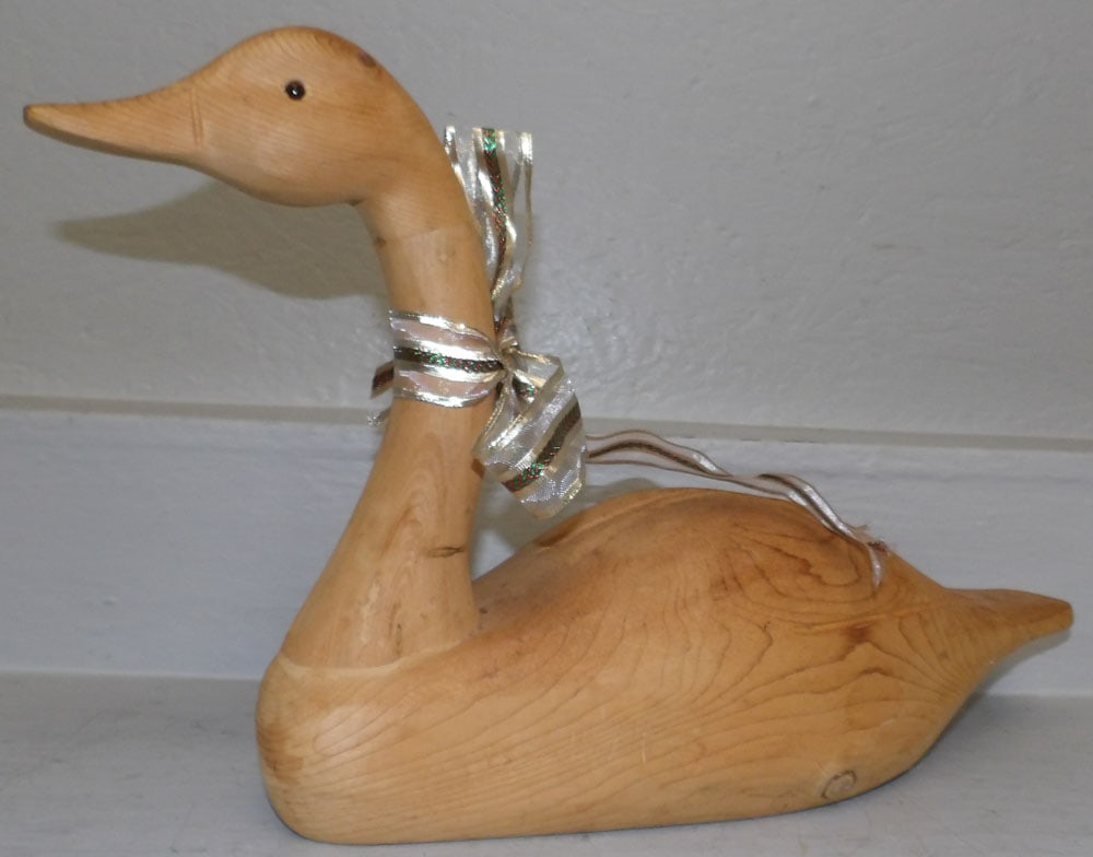 Carved Pine Swan Decoy: Carved Pine Swan Decoy . 12 1/4" H 20 1/2" L "ALL DESCRIPTIONS AND ANY CONDITION STATEMENT GIVEN BY LANGSTON AUCTION GALLERY ARE STRICTLY OPINIONS AND LANGSTON'S SHALL HAVE NO RESPONSIBILITY FOR