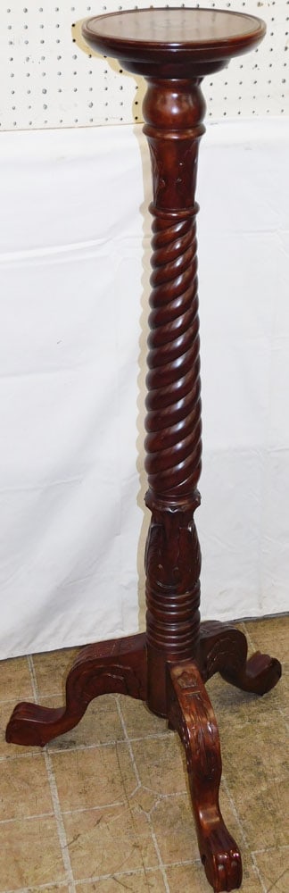Carved Mahogany Twist Column Torchiere Stand with Claw Feet: Carved Mahogany Twist Column Torchiere Stand with Claw Feet. 51 1/2" H Top: 9 3/4" Dia. "ALL DESCRIPTIONS AND ANY CONDITION STATEMENT GIVEN BY LANGSTON AUCTION GALLERY ARE STRICTLY OPINIONS AND