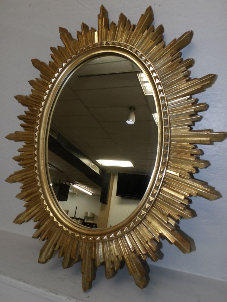 Gilded Frame Mirror by Syroco: Gilded Frame Mirror by Syroco . 30 3/4" x 25 1/4" "ALL DESCRIPTIONS AND ANY CONDITION STATEMENT GIVEN BY LANGSTON AUCTION GALLERY ARE STRICTLY OPINIONS AND LANGSTON'S SHALL HAVE NO RESPONSIBILITY FOR