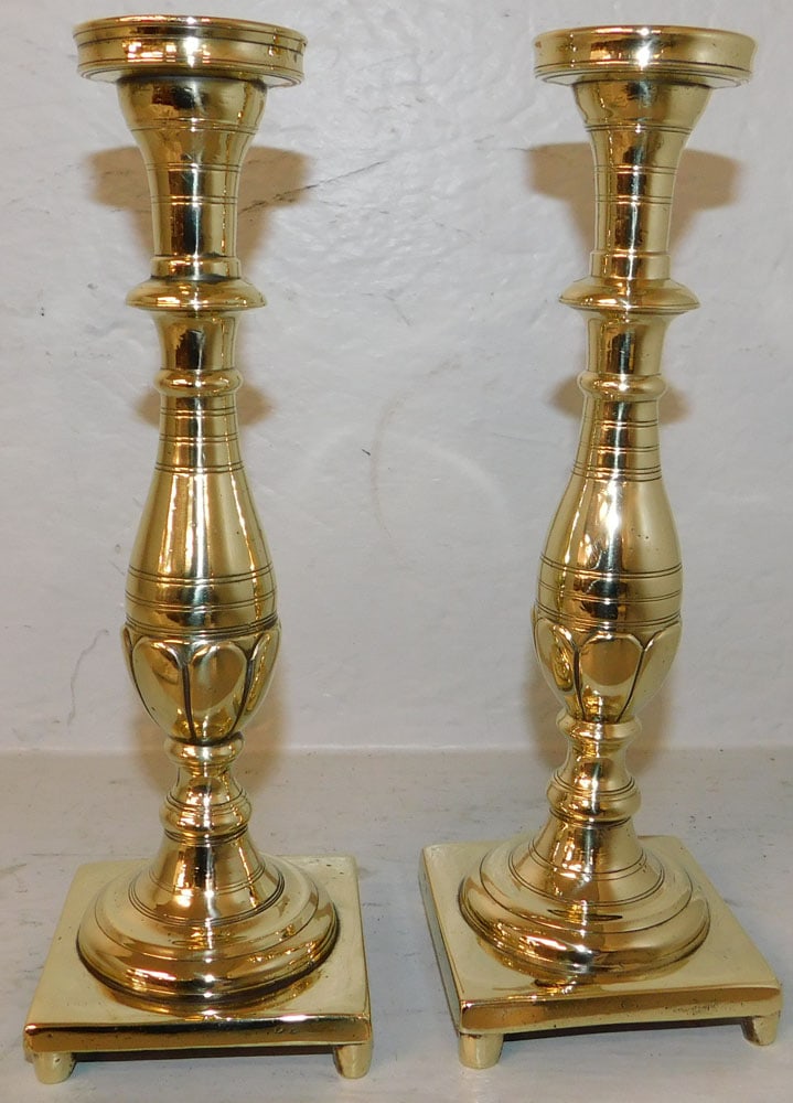 Pair of Antique Polished Cast Brass Candlesticks: Pair of Antique Polished Cast Brass Candlesticks . 10" H 3 1/2" Dia. "ALL DESCRIPTIONS AND ANY CONDITION STATEMENT GIVEN BY LANGSTON AUCTION GALLERY ARE STRICTLY OPINIONS AND LANGSTON'S SHALL HAVE NO