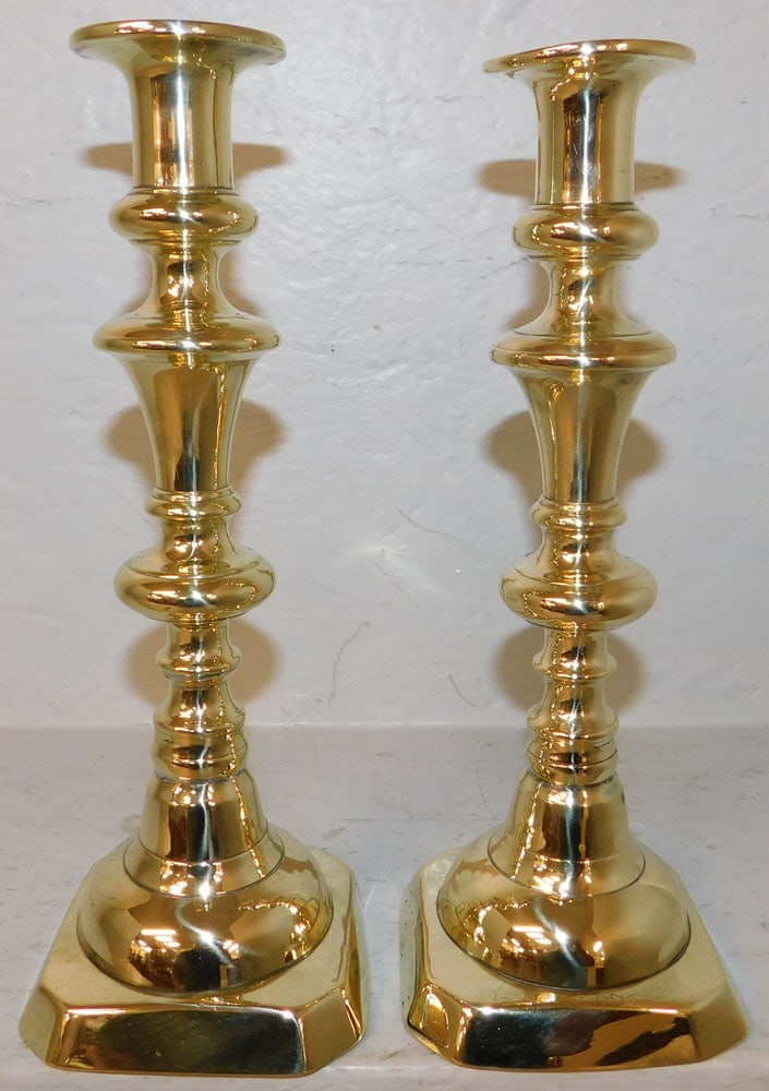 Pair of Antique Polished Brass Push Up Candlesticks: Pair of Antique Polished Brass Push Up Candlesticks . 11" H 4 1/4" Dia. "ALL DESCRIPTIONS AND ANY CONDITION STATEMENT GIVEN BY LANGSTON AUCTION GALLERY ARE STRICTLY OPINIONS AND LANGSTON'S SHALL HAVE 