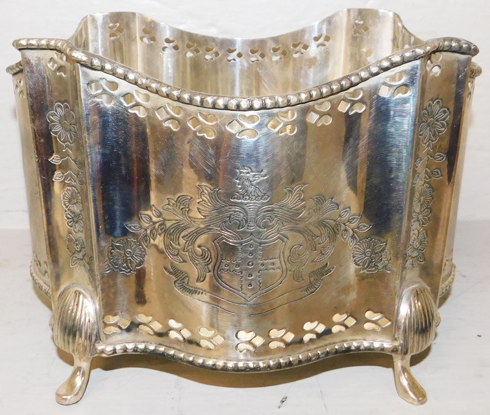 Silverplated Footed Jardiniere with Armorial Engraving: Silverplated Footed Jardiniere with Armorial Engraving . 6 1/2" H 9 1/2" W 7 3/4" D "ALL DESCRIPTIONS AND ANY CONDITION STATEMENT GIVEN BY LANGSTON AUCTION GALLERY ARE STRICTLY OPINIONS AND LANGSTON'S