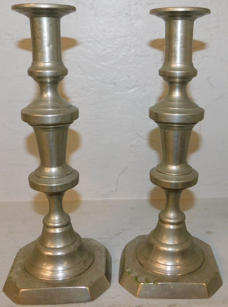 Pair of Pewter Candlesticks: Pair of Pewter Candlesticks . 10 1/2" H 4 1/2" W 3 3/4" D "ALL DESCRIPTIONS AND ANY CONDITION STATEMENT GIVEN BY LANGSTON AUCTION GALLERY ARE STRICTLY OPINIONS AND LANGSTON'S SHALL HAVE NO RESPONSIBIL