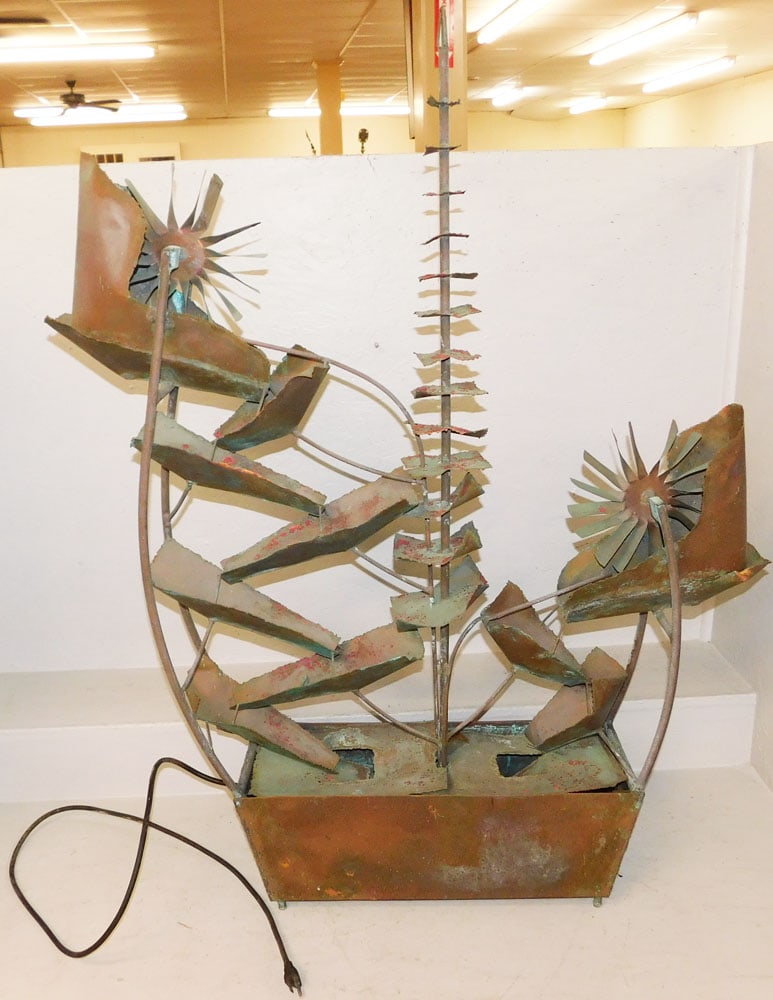 Copper Ship Form Water Fountain: Copper Ship Form Water Fountain . 49 1/2" H 38" W "ALL DESCRIPTIONS AND ANY CONDITION STATEMENT GIVEN BY LANGSTON AUCTION GALLERY ARE STRICTLY OPINIONS AND LANGSTON'S SHALL HAVE NO RESPONSIBILITY FOR 