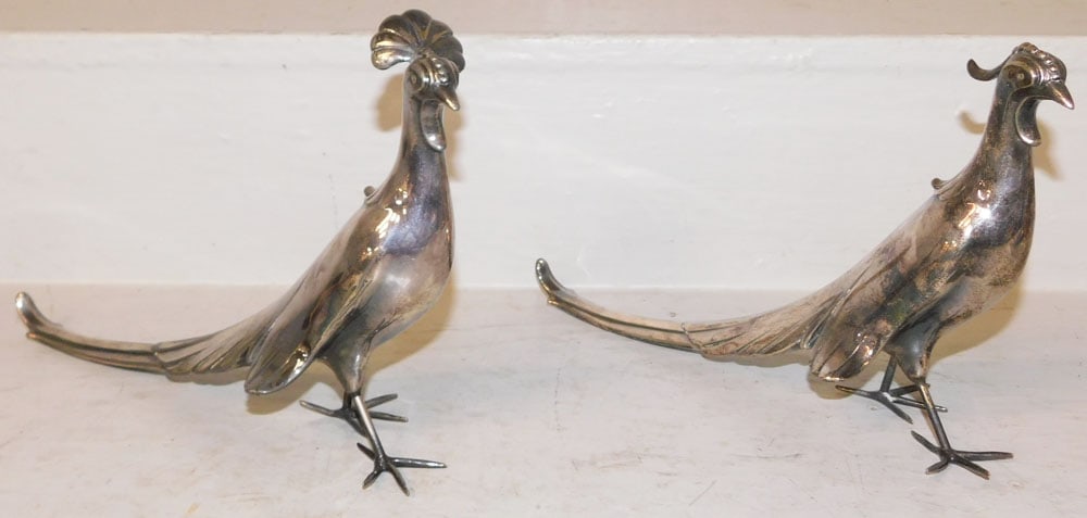 Pair of Silverplated Pheasants: Pair of Silverplated Pheasants . 7 1/2" H 12 1/4" L "ALL DESCRIPTIONS AND ANY CONDITION STATEMENT GIVEN BY LANGSTON AUCTION GALLERY ARE STRICTLY OPINIONS AND LANGSTON'S SHALL HAVE NO RESPONSIBILITY FO
