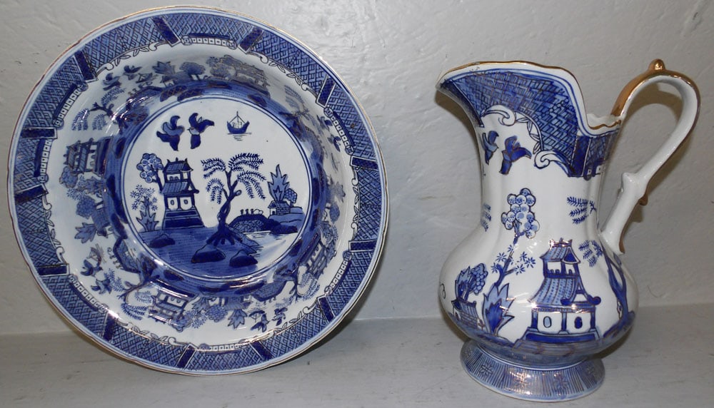 Oriental Blue & White Porcelain Pitcher: Oriental Blue & White Porcelain Pitcher . 11 1/4" H 8 1/2" W "ALL DESCRIPTIONS AND ANY CONDITION STATEMENT GIVEN BY LANGSTON AUCTION GALLERY ARE STRICTLY OPINIONS AND LANGSTON'S SHALL HAVE NO