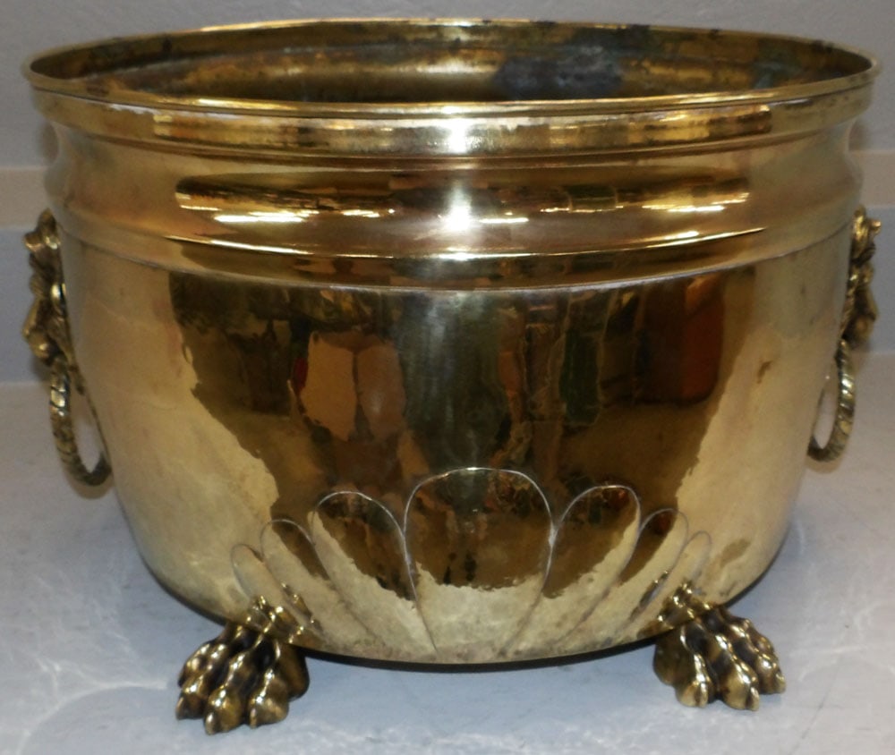 Antique Polished Brass Jardiniere with Lion Head Handles & Paw Feet: Antique Polished Brass Jardiniere with Lion Head Handles & Paw Feet. 13" H 20" W 18" D "ALL DESCRIPTIONS AND ANY CONDITION STATEMENT GIVEN BY LANGSTON AUCTION GALLERY ARE STRICTLY OPINIONS AND