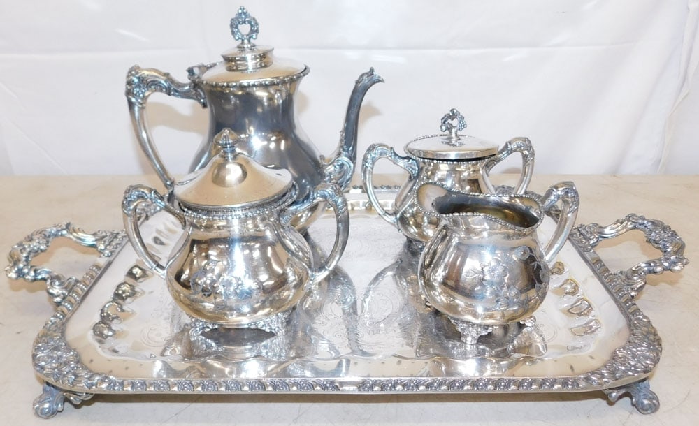 Five Piece Silverplated Tea Service: Five Piece Silverplated Tea Service . 21 3/4" W 13" D "ALL DESCRIPTIONS AND ANY CONDITION STATEMENT GIVEN BY LANGSTON AUCTION GALLERY ARE STRICTLY OPINIONS AND LANGSTON'S SHALL HAVE NO RESPONSIBILITY