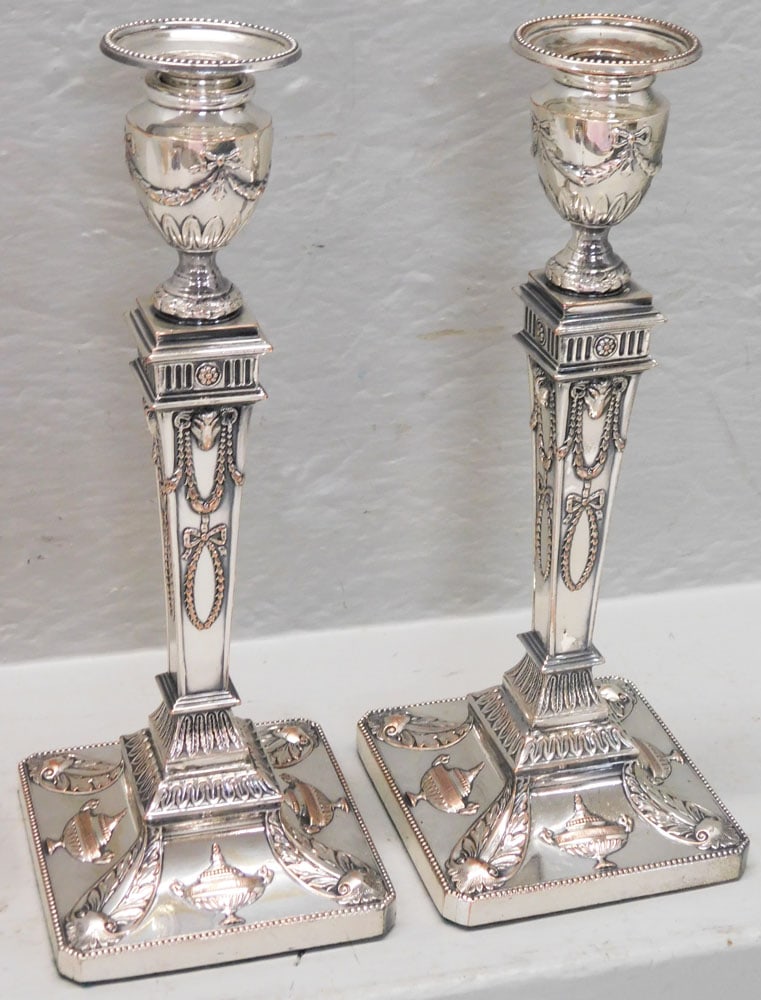 Pair of 19th Century Silver on Copper Neoclassical Ram & Urn Motif Candlesticks: Pair of 19th Century Silver on Copper Neoclassical Ram & Urn Motif Candlesticks. 12 1/4" H 5" Dia. "ALL DESCRIPTIONS AND ANY CONDITION STATEMENT GIVEN BY LANGSTON AUCTION GALLERY ARE STRICTLY