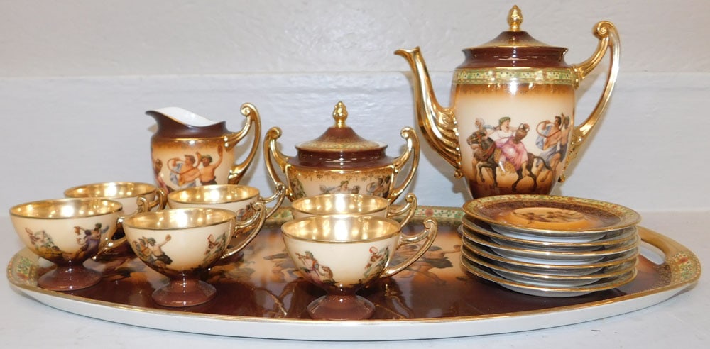 Sixteen Piece Painted Porcelain Carlsbad Czecho-Slovakia Tea Set with Tray: Sixteen Piece Painted Porcelain Carlsbad Czecho-Slovakia Tea Set with Tray . 20" W 11 3/4" D "ALL DESCRIPTIONS AND ANY CONDITION STATEMENT GIVEN BY LANGSTON AUCTION GALLERY ARE STRICTLY OPINIONS AND L