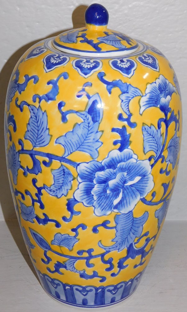 Oriental Yellow & Blue Chinoiserie Lotus & Scroll Motif Covered Urn: Oriental Yellow & Blue Chinoiserie Lotus & Scroll Motif Covered Urn. 13" H 7 1/2" Dia. "ALL DESCRIPTIONS AND ANY CONDITION STATEMENT GIVEN BY LANGSTON AUCTION GALLERY ARE STRICTLY OPINIONS AND