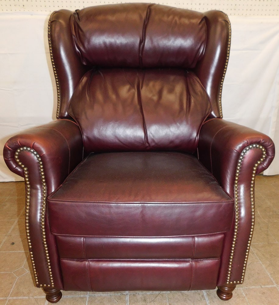 Leather Upholstered Recliner: Leather Upholstered Recliner . 41" H 33 1/2" W 38" D "ALL DESCRIPTIONS AND ANY CONDITION STATEMENT GIVEN BY LANGSTON AUCTION GALLERY ARE STRICTLY OPINIONS AND LANGSTON'S SHALL HAVE NO RESPONSIBILITY