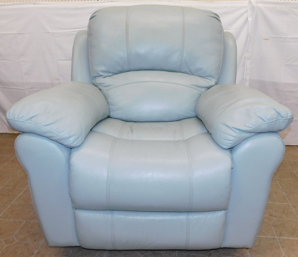 Leather Upholstered Recliner: Leather Upholstered Recliner . 39 1/2" H 40" W 38" D "ALL DESCRIPTIONS AND ANY CONDITION STATEMENT GIVEN BY LANGSTON AUCTION GALLERY ARE STRICTLY OPINIONS AND LANGSTON'S SHALL HAVE NO RESPONSIBILITY