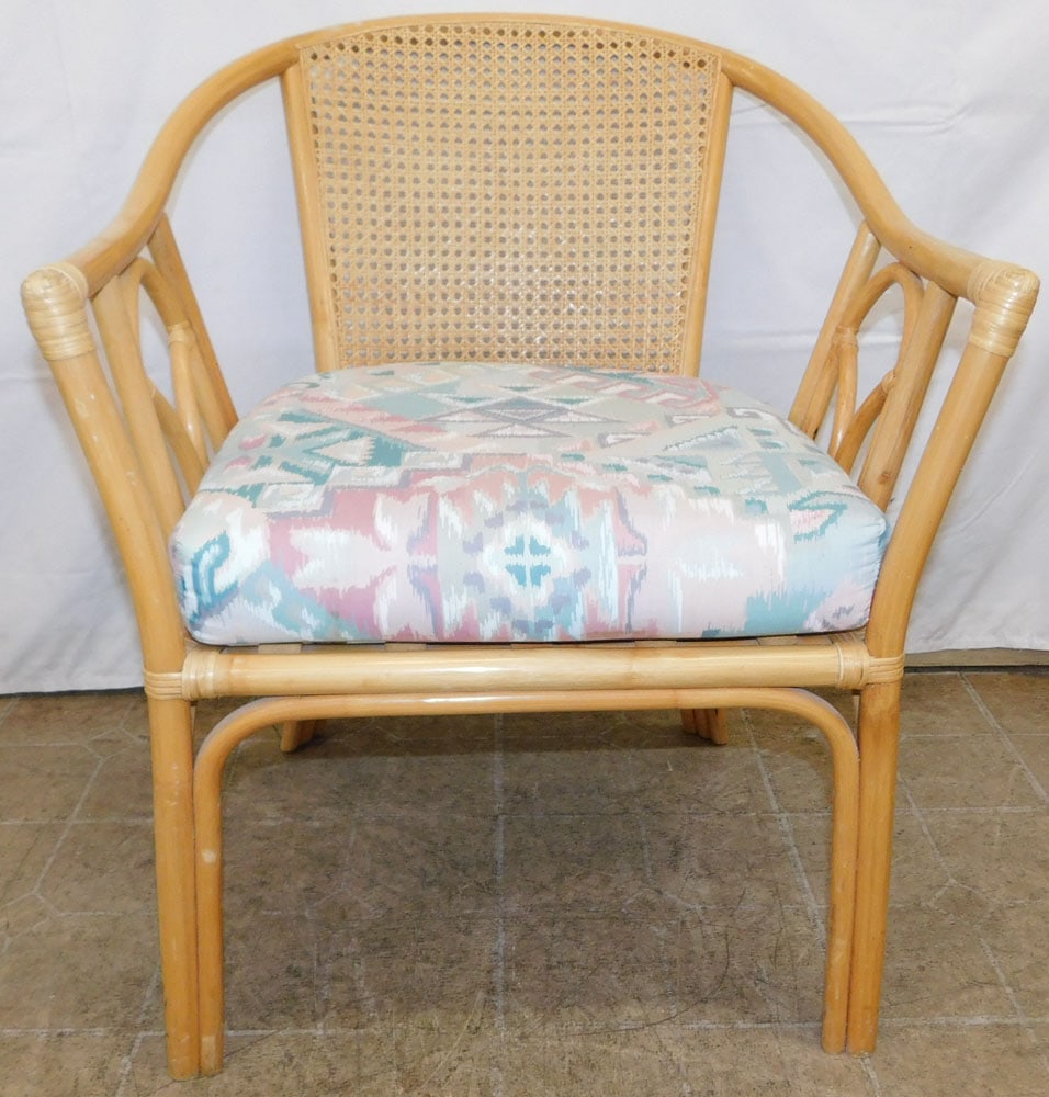 Rattan Arm Chair: Rattan Arm Chair . 29 1/2" H 24" W 26" D "ALL DESCRIPTIONS AND ANY CONDITION STATEMENT GIVEN BY LANGSTON AUCTION GALLERY ARE STRICTLY OPINIONS AND LANGSTON'S SHALL HAVE NO RESPONSIBILITY FOR ERRORS OR