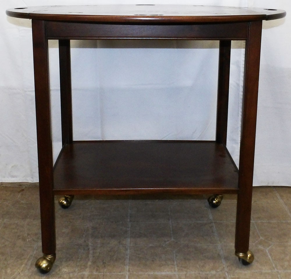 Mahogany Rolling Cart with Butler's Tray Top: Mahogany Rolling Cart with Butler's Tray Top . 30 3/4" H 34" W 20" D "ALL DESCRIPTIONS AND ANY CONDITION STATEMENT GIVEN BY LANGSTON AUCTION GALLERY ARE STRICTLY OPINIONS AND LANGSTON'S SHALL HAVE NO