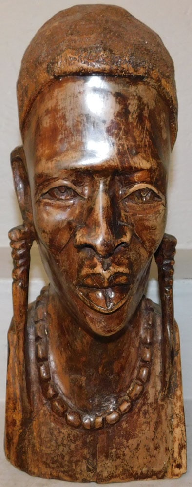 Carved African Wood Bust: Carved African Wood Bust . 16" H 6 3/4" W 6 1/2" D "ALL DESCRIPTIONS AND ANY CONDITION STATEMENT GIVEN BY LANGSTON AUCTION GALLERY ARE STRICTLY OPINIONS AND LANGSTON'S SHALL HAVE NO RESPONSIBILITY
