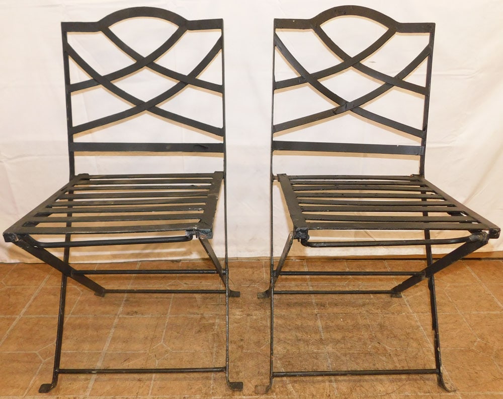Pair of Painted Forged Iron Folding Chairs: Pair of Painted Forged Iron Folding Chairs . 34" H 17" W 22" D "ALL DESCRIPTIONS AND ANY CONDITION STATEMENT GIVEN BY LANGSTON AUCTION GALLERY ARE STRICTLY OPINIONS AND LANGSTON'S SHALL HAVE NO