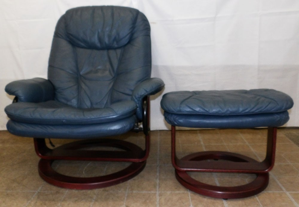 Modern Leather Upholstered Recliner & Ottoman: Modern Leather Upholstered Recliner & Ottoman . 37 1/2" H 32" W 31" D "ALL DESCRIPTIONS AND ANY CONDITION STATEMENT GIVEN BY LANGSTON AUCTION GALLERY ARE STRICTLY OPINIONS AND LANGSTON'S SHALL HAVE NO