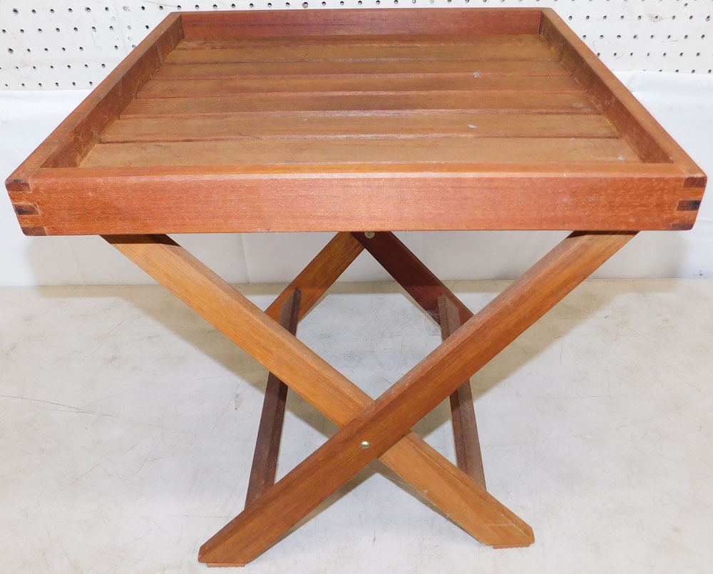 Mid Century Modern Teak Wood Folding Tray Top Stand: Mid Century Modern Teak Wood Folding Tray Top Stand . 18 3/4" H 18 3/4" Dia. "ALL DESCRIPTIONS AND ANY CONDITION STATEMENT GIVEN BY LANGSTON AUCTION GALLERY ARE STRICTLY OPINIONS AND LANGSTON'S SHALL