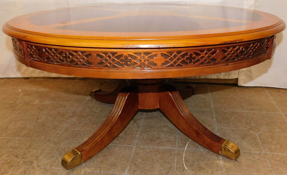 Round Mahogany Coffee Table: Round Mahogany Coffee Table . 16 3/4" H 36" Dia. "ALL DESCRIPTIONS AND ANY CONDITION STATEMENT GIVEN BY LANGSTON AUCTION GALLERY ARE STRICTLY OPINIONS AND LANGSTON'S SHALL HAVE NO RESPONSIBILITY FOR