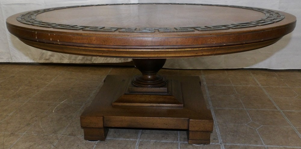 Round Walnut Mid Century Modern Coffee Table: Round Walnut Mid Century Modern Coffee Table. 18" H 40" Dia. "ALL DESCRIPTIONS AND ANY CONDITION STATEMENT GIVEN BY LANGSTON AUCTION GALLERY ARE STRICTLY OPINIONS AND LANGSTON'S SHALL HAVE NO