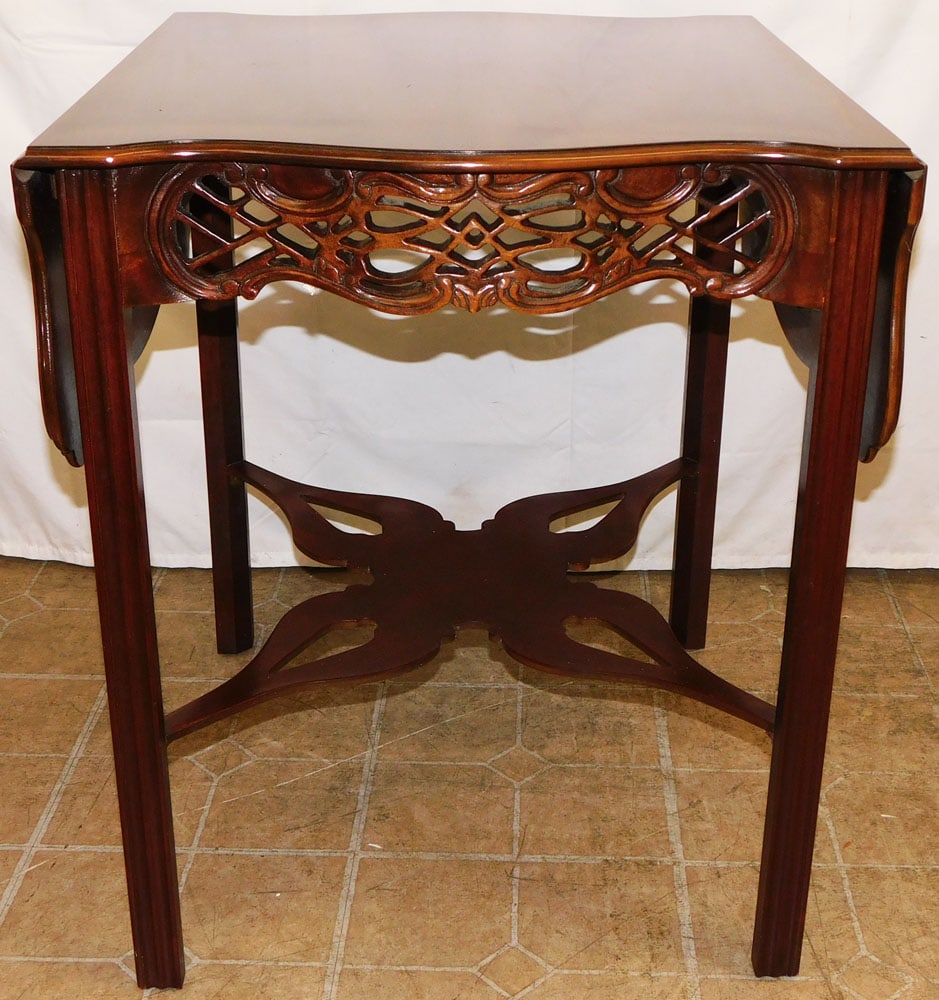 Mahogany Open Work Stretcher Base Drop Leaf Table by Baker Historic Charleston: Mahogany Open Work Stretcher Base Drop Leaf Table by Baker Historic Charleston. 28" H 24" W 25 1/2" D "ALL DESCRIPTIONS AND ANY CONDITION STATEMENT GIVEN BY LANGSTON AUCTION GALLERY ARE STRICTLY