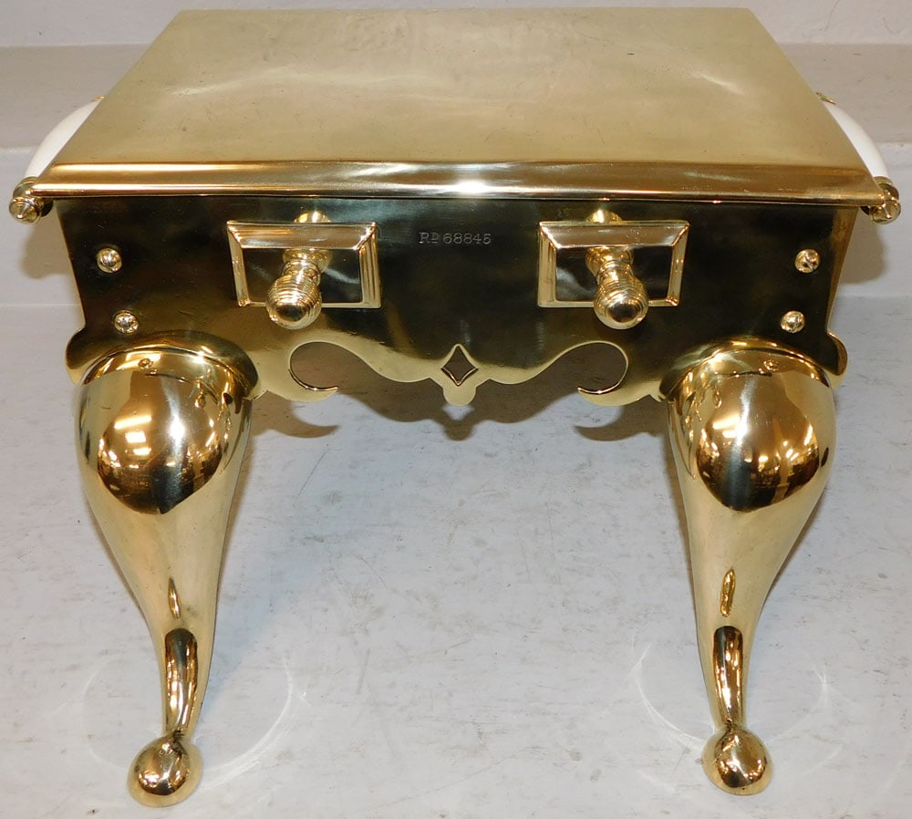 Antique Polished Brass Footman with Porcelain Handles: Antique Polished Brass Footman with Porcelain Handles . 11 1/2" H 18 1/2" W 14 1/2" D "ALL DESCRIPTIONS AND ANY CONDITION STATEMENT GIVEN BY LANGSTON AUCTION GALLERY ARE STRICTLY OPINIONS AND LANGSTON