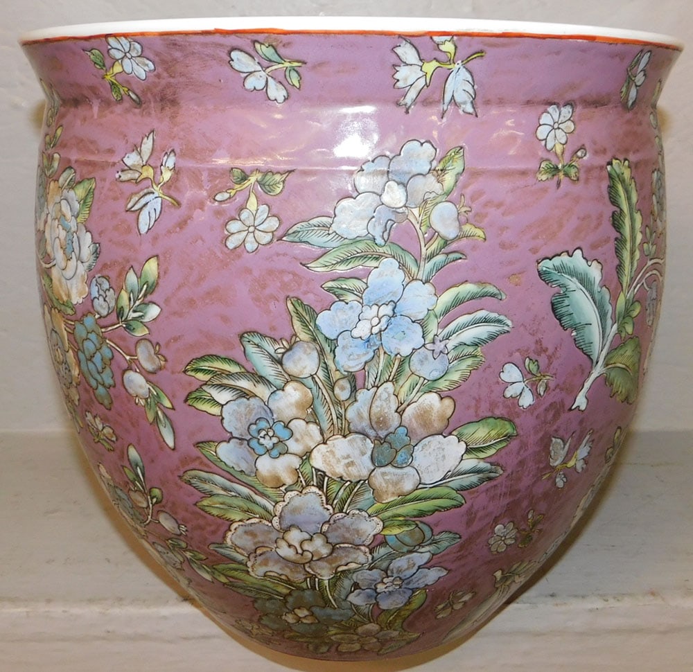 Oriental Porcelain Jardiniere: Oriental Porcelain Jardiniere . 11 1/2" H 12 1/2" Dia. "ALL DESCRIPTIONS AND ANY CONDITION STATEMENT GIVEN BY LANGSTON AUCTION GALLERY ARE STRICTLY OPINIONS AND LANGSTON'S SHALL HAVE NO